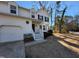 View of a two-story house with a garage at 4300 Hickory Ridge Dr, Raleigh, NC 27609