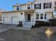 Charming two-story home with a two-car garage and well-maintained front yard at 4300 Hickory Ridge Dr, Raleigh, NC 27609