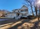 Well-maintained two-story home with a two-car garage, front yard, and sunlight at 4300 Hickory Ridge Dr, Raleigh, NC 27609