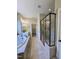 Bathroom with soaking tub and glass-enclosed shower at 4538 Brighton Ridge Dr, Apex, NC 27539