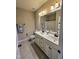 Functional bathroom featuring a double vanity, and a mirror, ensuring a comfortable experience at 4538 Brighton Ridge Dr, Apex, NC 27539