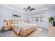 Bedroom with large windows and ensuite bathroom at 4538 Brighton Ridge Dr, Apex, NC 27539