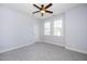 Spacious bedroom with two bright windows and neutral carpet, offering a serene and relaxing retreat at 4538 Brighton Ridge Dr, Apex, NC 27539