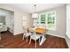 Cozy breakfast nook featuring a wooden table, chair set, and large windows with a view at 4538 Brighton Ridge Dr, Apex, NC 27539