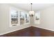Bright dining room with large windows at 4538 Brighton Ridge Dr, Apex, NC 27539