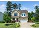 Charming two-story home with a well-manicured lawn and inviting curb appeal at 4538 Brighton Ridge Dr, Apex, NC 27539