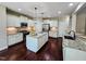Bright kitchen features stainless steel appliances, granite countertops, and large center island with dual sinks at 4538 Brighton Ridge Dr, Apex, NC 27539