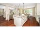 Spacious kitchen with granite countertops, stainless steel appliances, and hardwood floors at 4538 Brighton Ridge Dr, Apex, NC 27539