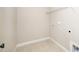 Utility room featuring tile flooring and basic fixtures, providing a practical space for laundry tasks at 4538 Brighton Ridge Dr, Apex, NC 27539