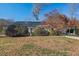 Ranch home with mature landscaping and a spacious yard at 4908 Winterlochen Rd, Raleigh, NC 27603