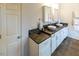 Bathroom with double vanity and stone countertops at 5240 Indigo Moon Way, Raleigh, NC 27613