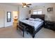 Bright bedroom with ensuite bathroom access and ceiling fan at 5240 Indigo Moon Way, Raleigh, NC 27613