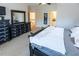 Primary bedroom with large dresser and access to hallway at 5240 Indigo Moon Way, Raleigh, NC 27613