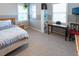 Cozy bedroom with built-in shelving and desk area at 5240 Indigo Moon Way, Raleigh, NC 27613
