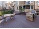 Outdoor deck with a dining table, chairs, and an outdoor grill area at 5240 Indigo Moon Way, Raleigh, NC 27613