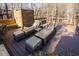 Inviting outdoor deck area featuring comfortable lounge chairs and a privacy screen, perfect for relaxing at 5240 Indigo Moon Way, Raleigh, NC 27613