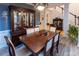 Formal dining room with hardwood floors and built-in hutch at 5240 Indigo Moon Way, Raleigh, NC 27613