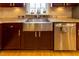 Modern kitchen with farmhouse sink and stainless steel appliances at 5240 Indigo Moon Way, Raleigh, NC 27613