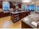 Spacious kitchen with large island, granite countertops, and stainless steel appliances at 5240 Indigo Moon Way, Raleigh, NC 27613
