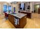 Spacious kitchen with large island, granite countertops and stainless steel appliances at 5240 Indigo Moon Way, Raleigh, NC 27613