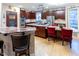 Open concept kitchen with granite island and breakfast bar at 5240 Indigo Moon Way, Raleigh, NC 27613