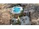 Aerial view showcasing the pool, outdoor lounge areas, and an inviting fire pit at 5240 Indigo Moon Way, Raleigh, NC 27613