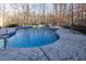 Gorgeous swimming pool with a stone surround and clear, refreshing water at 5240 Indigo Moon Way, Raleigh, NC 27613