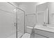 Bathroom with a shower, toilet, vanity, and mirror at 529 Ravensworth Dr, Garner, NC 27529