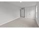 Spacious bedroom with neutral walls and carpet at 529 Ravensworth Dr, Garner, NC 27529