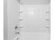 Clean bathroom with white tile shower/tub combo at 601 Second Ave, Burlington, NC 27215