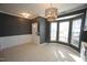 Formal dining area with a bay window and chair rail at 1013 Red Hat Ln, Durham, NC 27713