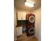 Laundry room with stackable washer and dryer at 1013 Red Hat Ln, Durham, NC 27713