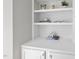 Built-in shelves with decorative objects at 103 Carpenter Town Ln, Cary, NC 27519