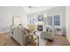 Cozy living room with vaulted ceiling, fireplace, and hardwood floors at 103 Carpenter Town Ln, Cary, NC 27519