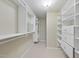 Large walk-in closet with built-in shelves and drawers at 118 Talon Dr, Cary, NC 27518