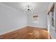 Formal dining room with hardwood floors and plenty of natural light at 1200 Rogers Rd, Graham, NC 27253