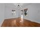 Formal dining room with hardwood floors and plenty of natural light at 1200 Rogers Rd, Graham, NC 27253