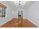 Formal dining room with hardwood floors and access to the living room at 1200 Rogers Rd, Graham, NC 27253