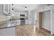 Updated kitchen with white cabinets and granite countertops at 1200 Rogers Rd, Graham, NC 27253