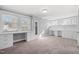 Bright office space with two desks and built-in shelving at 1200 Rogers Rd, Graham, NC 27253