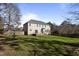 Two-story house with deck, backyard, and wooden fence at 1216 Magnolia Hill Rd, Garner, NC 27529