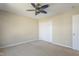 Bright bedroom with ceiling fan and double-door closet at 1216 Magnolia Hill Rd, Garner, NC 27529