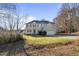 Two-story house featuring a large front yard and attached garage at 1216 Magnolia Hill Rd, Garner, NC 27529