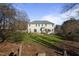 Two-story house with large backyard and wooden deck at 1216 Magnolia Hill Rd, Garner, NC 27529