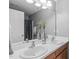 Clean bathroom with double sinks and a large mirror at 1316 Holly Grove Way, Durham, NC 27713