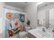 Clean bathroom with shower/tub combo and updated vanity at 1316 Holly Grove Way, Durham, NC 27713