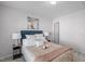 Cozy bedroom with a comfortable bed and plenty of natural light at 1316 Holly Grove Way, Durham, NC 27713
