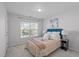 Cozy bedroom with a comfortable bed and plenty of natural light at 1316 Holly Grove Way, Durham, NC 27713
