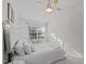 Spacious bedroom with a plush bed and ample natural light at 1316 Holly Grove Way, Durham, NC 27713