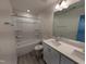 A modern bathroom with a tub and shower combination and dual sink vanity at 143 Steppe Way, Garner, NC 27529